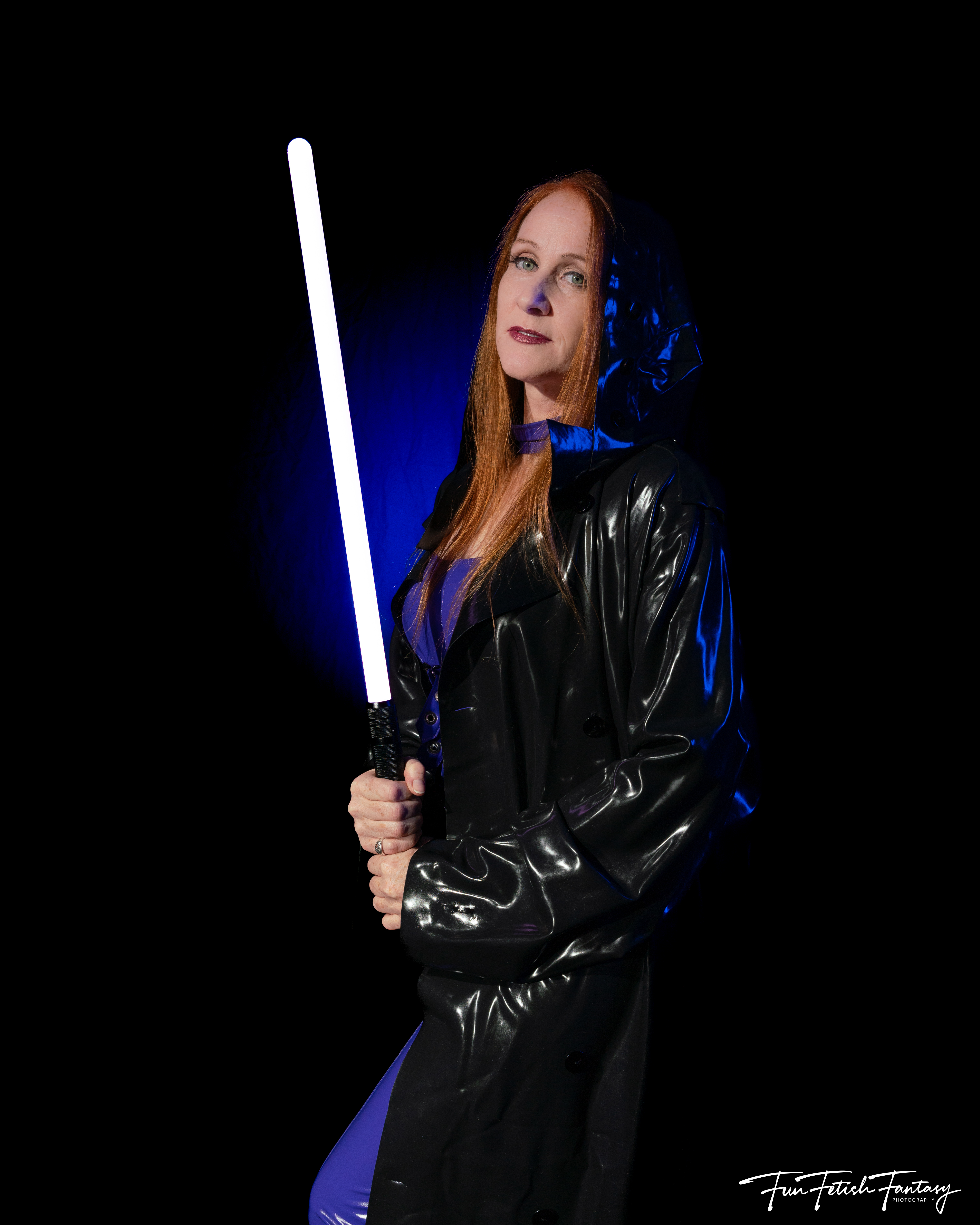 Her Majesty holding light saber